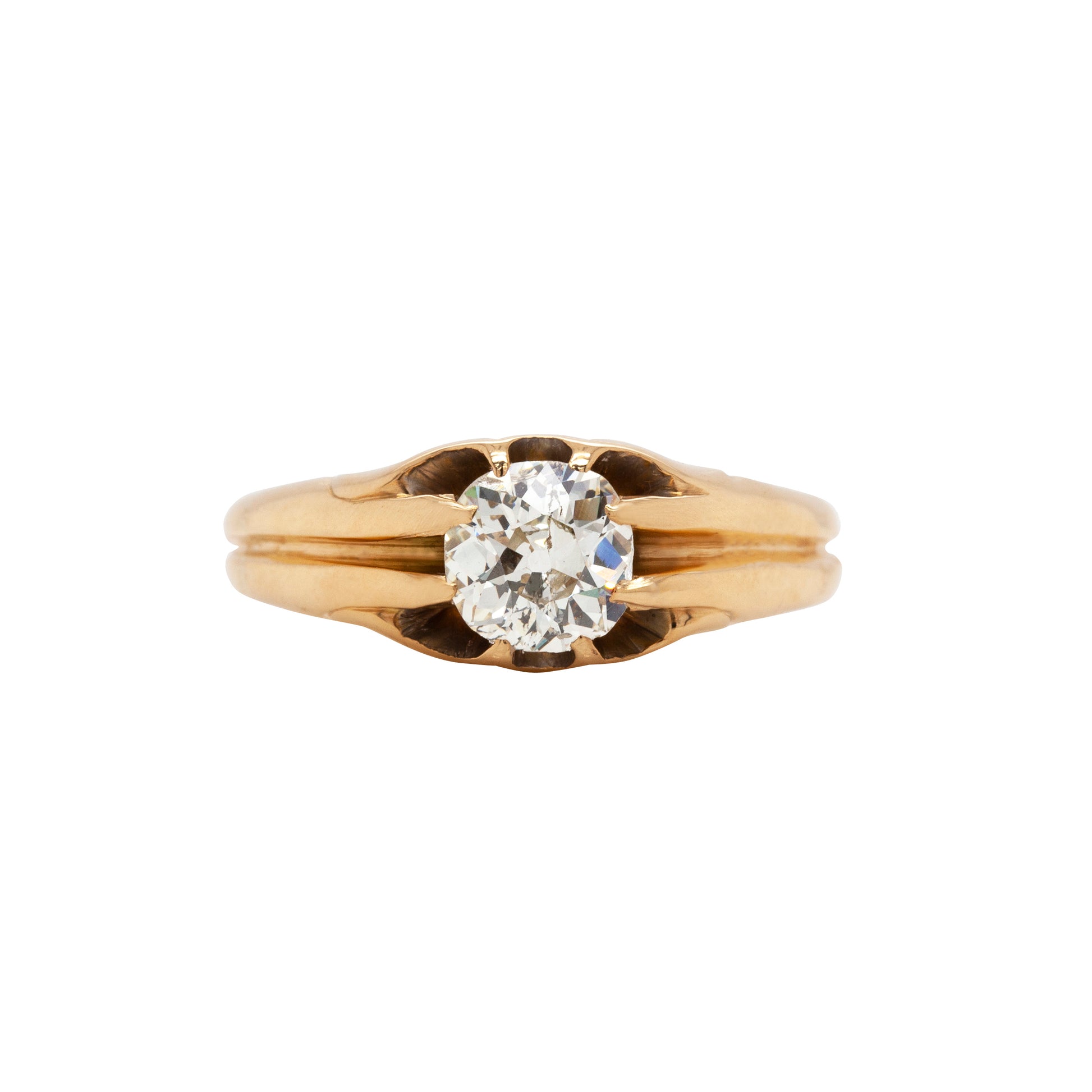 An 18 carat yellow gold old mine cut diamond gent's ring with a UK finger size 'R'.