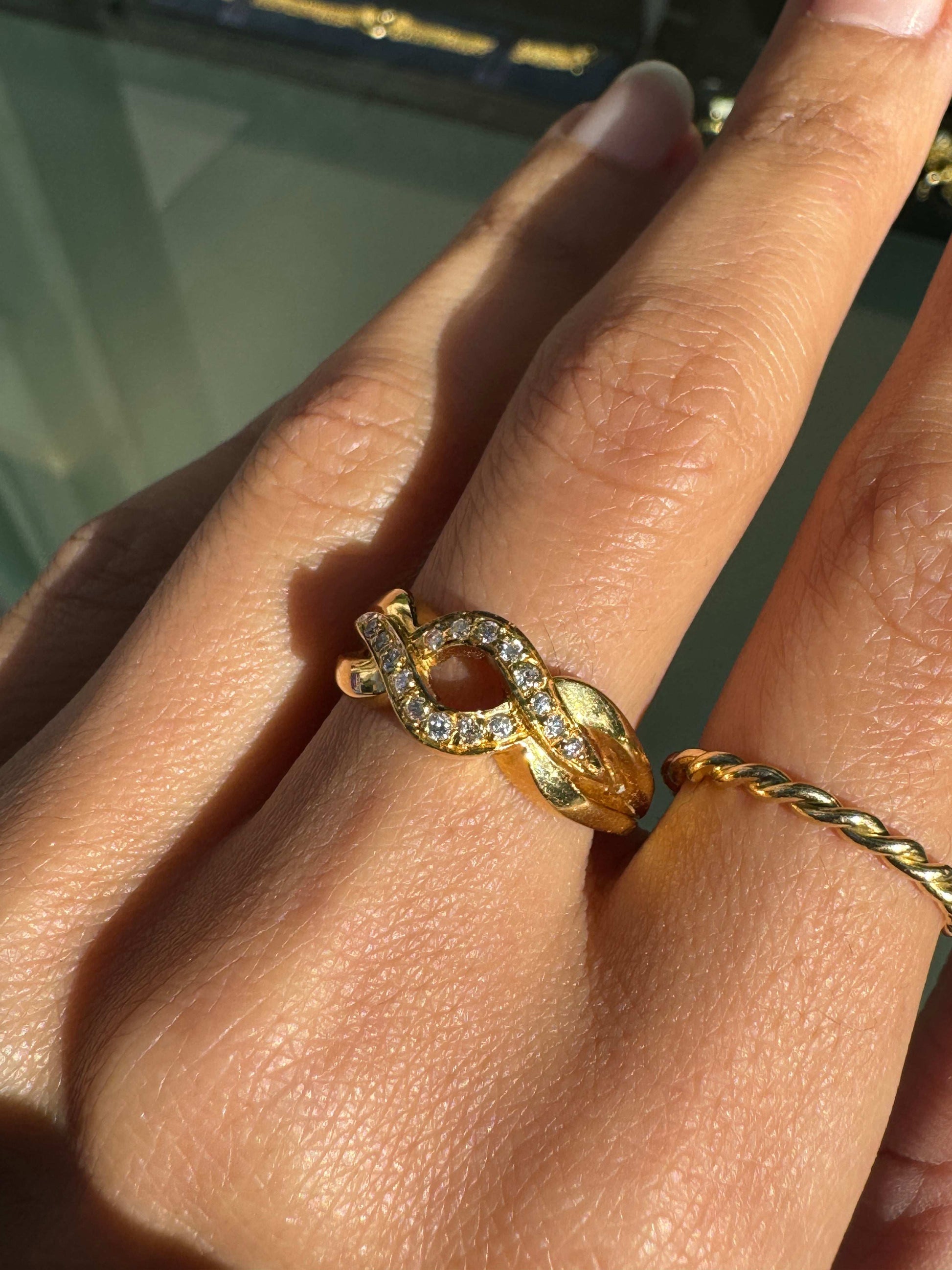 Diamond and 18 Carat Yellow Gold Open Work Intertwined Wave Band Ring