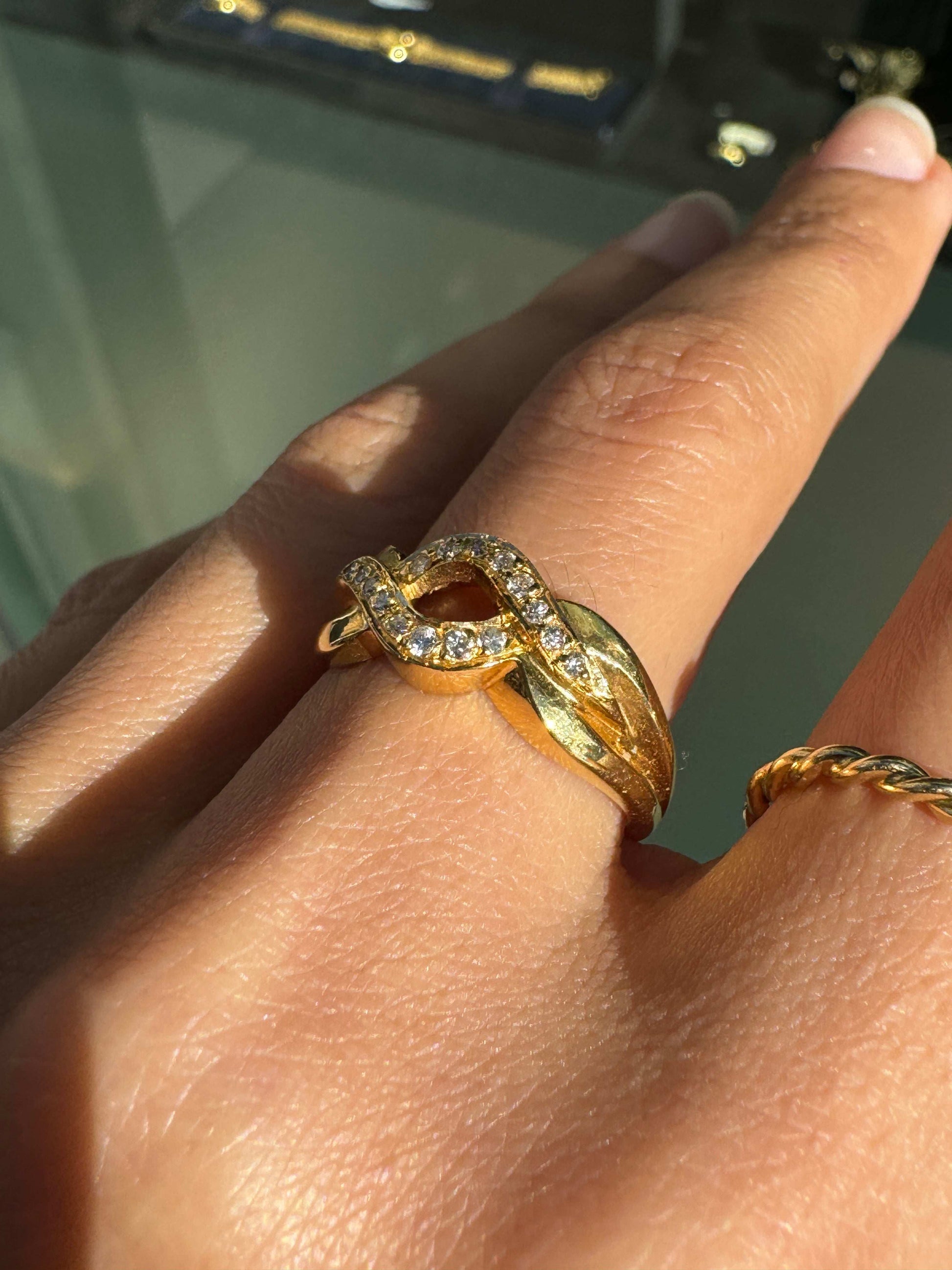 Diamond and 18 Carat Yellow Gold Open Work Intertwined Wave Band Ring