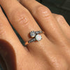 lady wearing Opal & Diamond 14K Rose Gold Crossover Toi Et Moi Engagement Ring, c.1900s