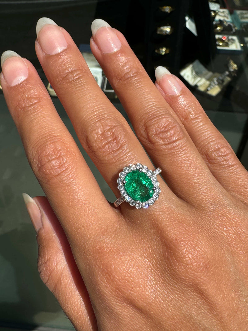 2.39ct Oval Emerald and Diamond Halo 18 Carat White Gold Cluster Engagement Ring