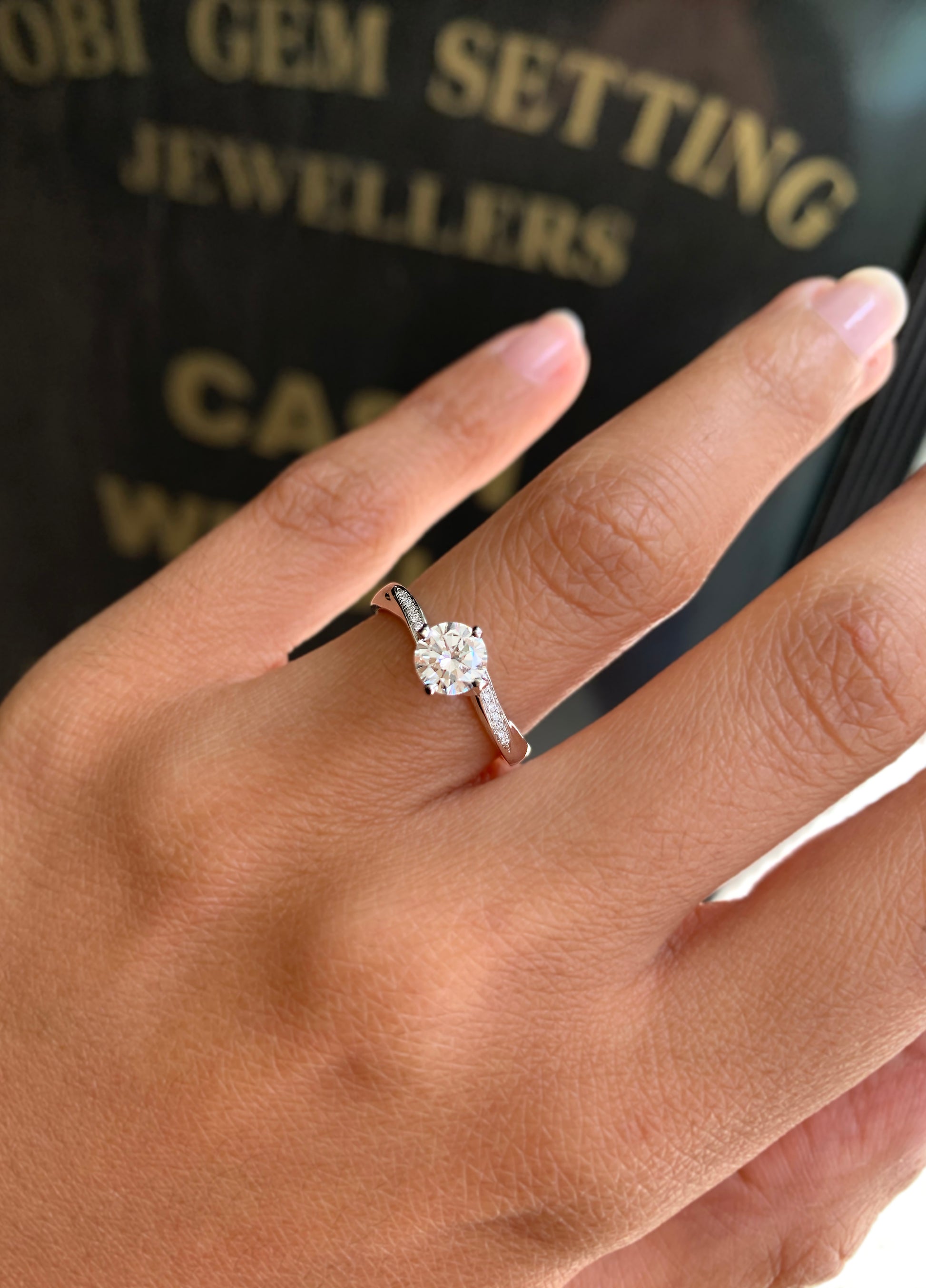 GIA F VS1 0.55ct Round Brilliant Cut Diamond Platinum Twist Engagement Ring - Tobi Gem Setting