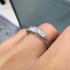 lady wearing Antique Five Stone Old Cut Diamond and Platinum Ring, circa 1900 close up