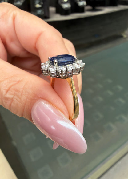 Blue Sapphire and Diamond Halo 18K White and Yellow Gold Cluster Engagement Ring