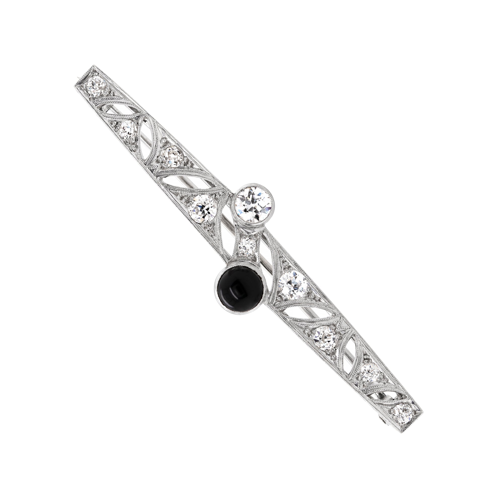 An Art Deco old cut diamond and onyx platinum brooch from the early 20th century.