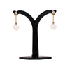 Freshwater Pearl and Diamond 18 Carat Yellow Gold Drop Earrings on a stand