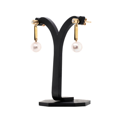 Freshwater Pearl and Diamond 18 Carat Yellow Gold Drop Earrings on a stand rear detail