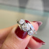 Old Cut Three-Stone Twist 18 Carat Gold and Platinum Ring, Circa 1920s