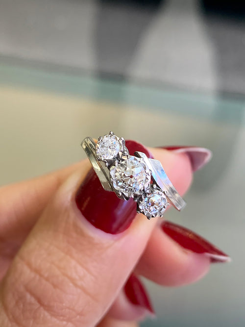 Old Cut Three-Stone Twist 18 Carat Gold and Platinum Ring, Circa 1920s