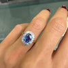 Oval Blue Sapphire and Diamond Halo 18K Gold Coronet Cluster Engagement Ring