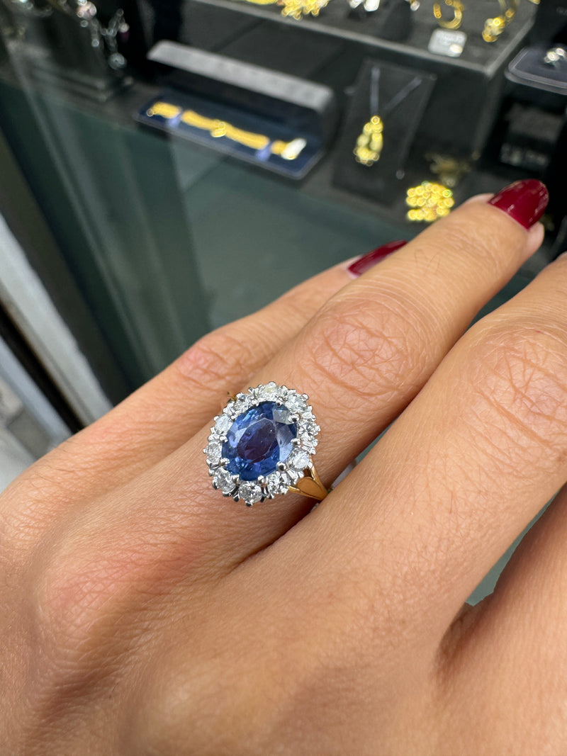Oval Blue Sapphire and Diamond Halo 18K Gold Coronet Cluster Engagement Ring