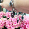Theo Fennell Skull and Horn Charm Ruby and Diamond 18 Carat Gold Bracelet