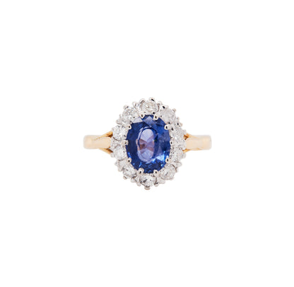 Oval Blue Sapphire and Diamond Halo 18K Gold Coronet Cluster Engagement Ring