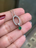 0.20ct Diamond and Emerald 18 Carat White Gold Oval Pendant