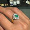 0.84ct Oval Emerald and Diamond Halo 18K Yellow and White Gold Cluster Ring