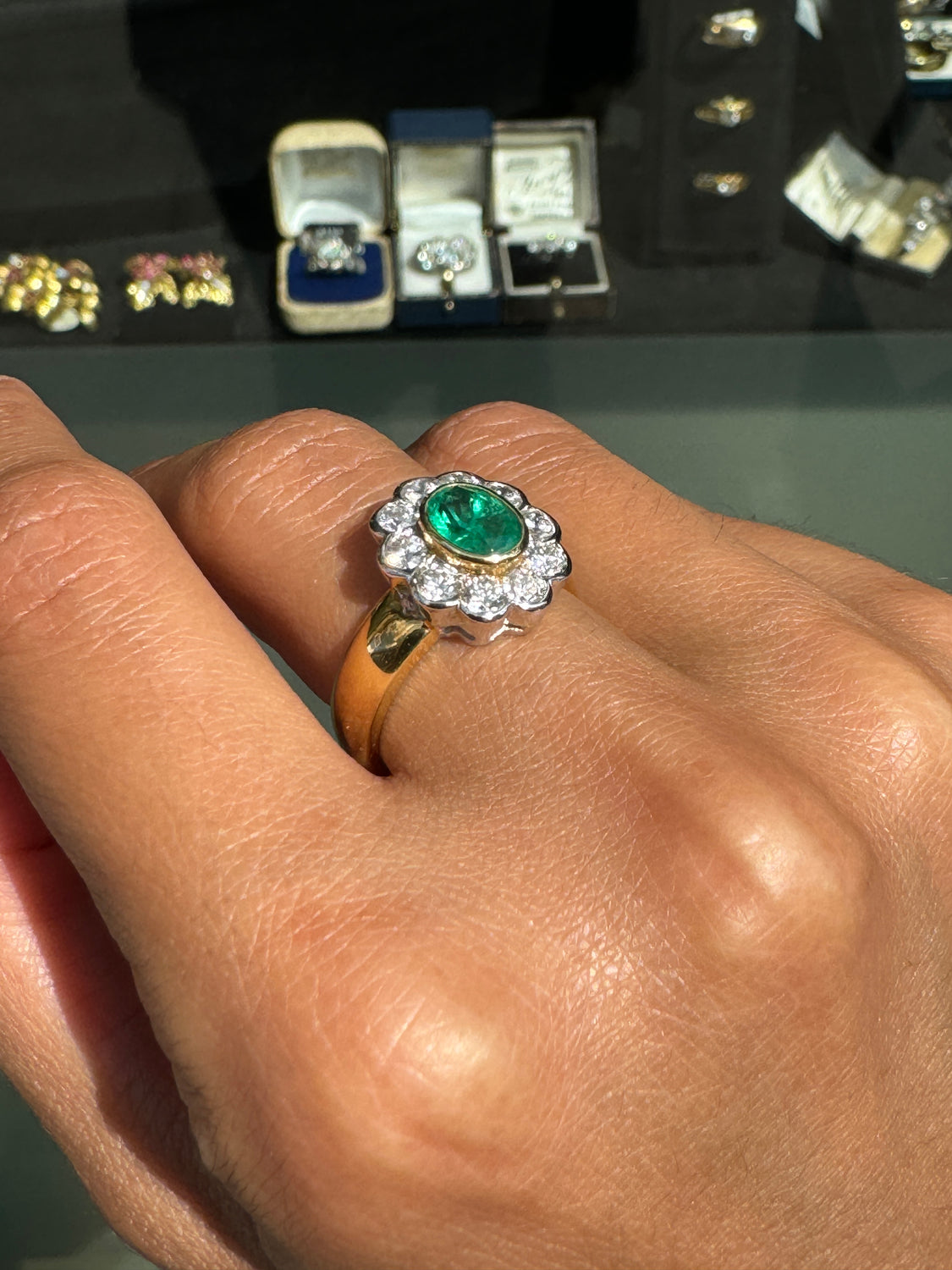 0.84ct Oval Emerald and Diamond Halo 18K Yellow and White Gold Cluster Ring