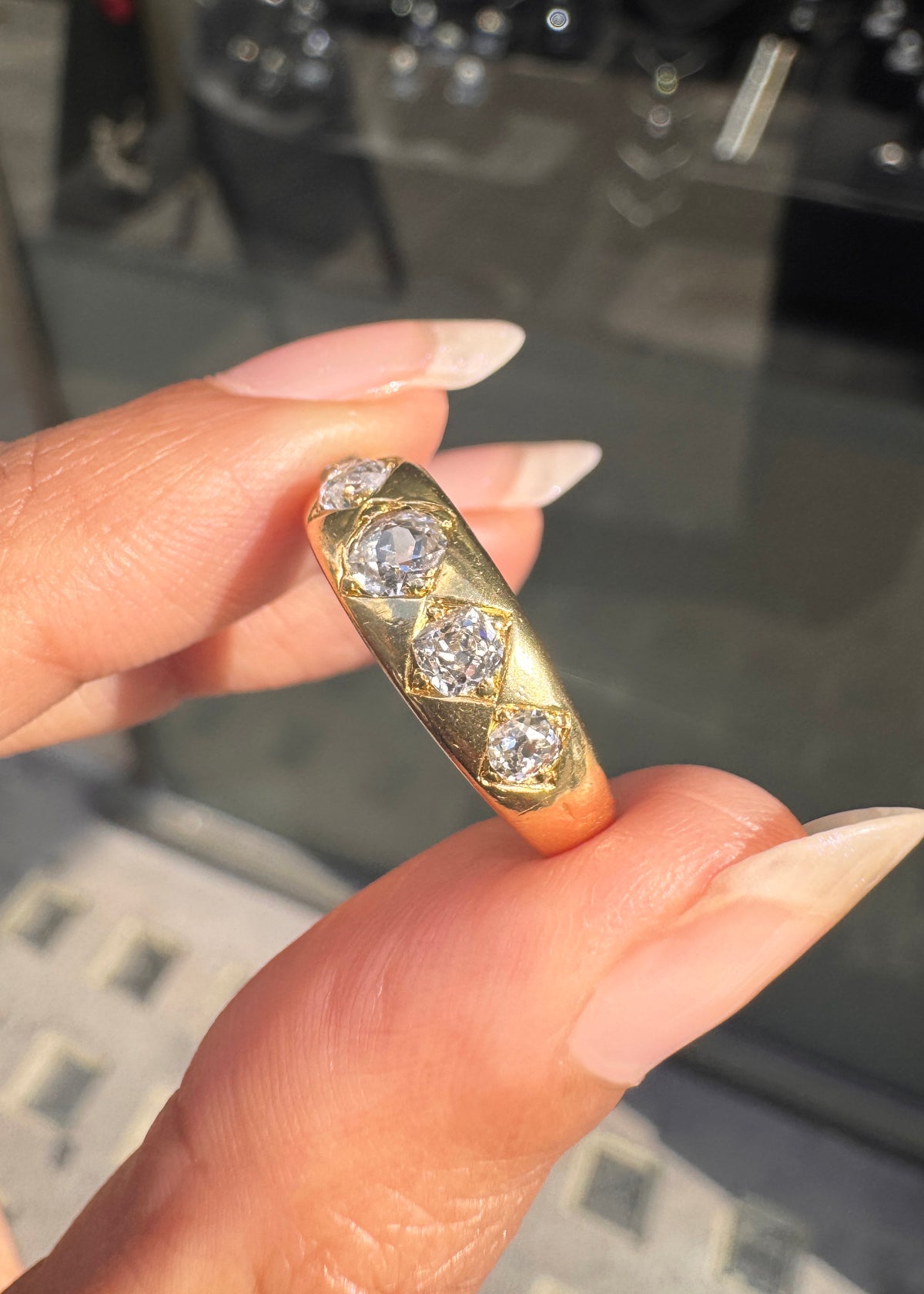 Late Victorian Old Mine Cut Diamond Five-Stone Band Ring in 18 Carat Yellow Gold