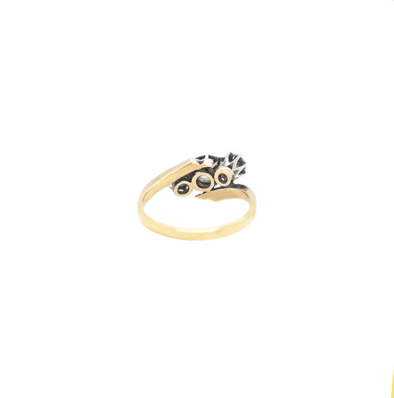 Old Cut Three-Stone Twist 18 Carat Gold and Platinum Ring, Circa 1920s