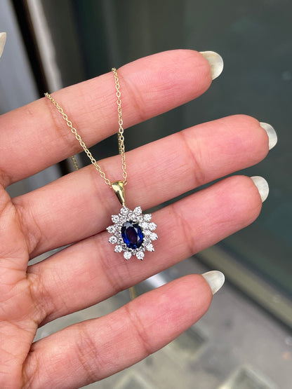 Oval Blue Sapphire and Diamond 18 Carat White and Yellow Gold Cluster Pendant