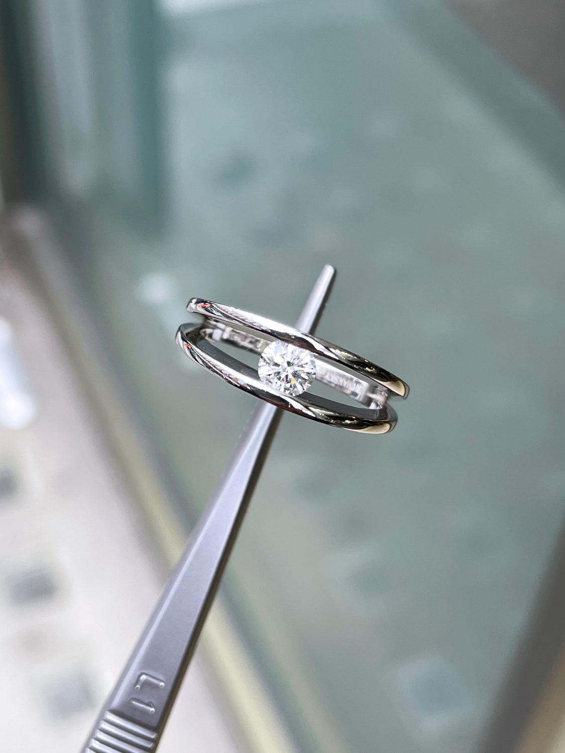 0.35ct F SI2 Round Brilliant Cut Tension Set Diamond Platinum Engagement Ring