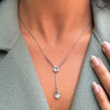 lady wearing a two stone 1920's Aquamarine and Palladium Drop Necklace