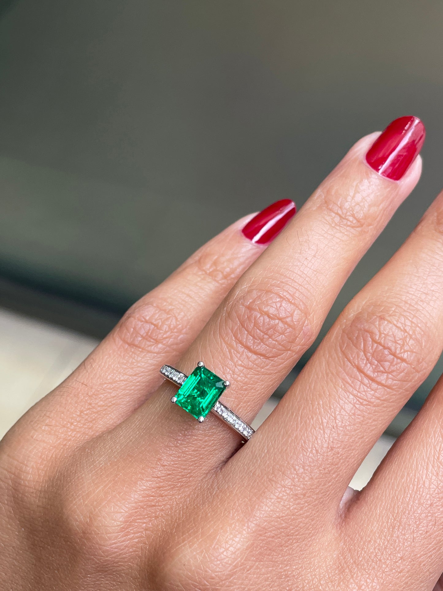 1.36 Carat Emerald Cut Emerald and Diamond Platinum Engagement Ring