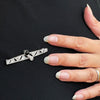 Art Deco Old Cut Diamond and Onyx Platinum Brooch, Circa 1920s
