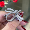 hand holiday vintage diamond ribbon brooch