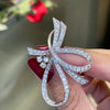French Vintage Diamond Platinum Ribbon Brooch, Circa 1950's
