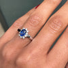 Oval Blue Sapphire and Diamond 18 Carat White Gold Cluster Engagement Ring