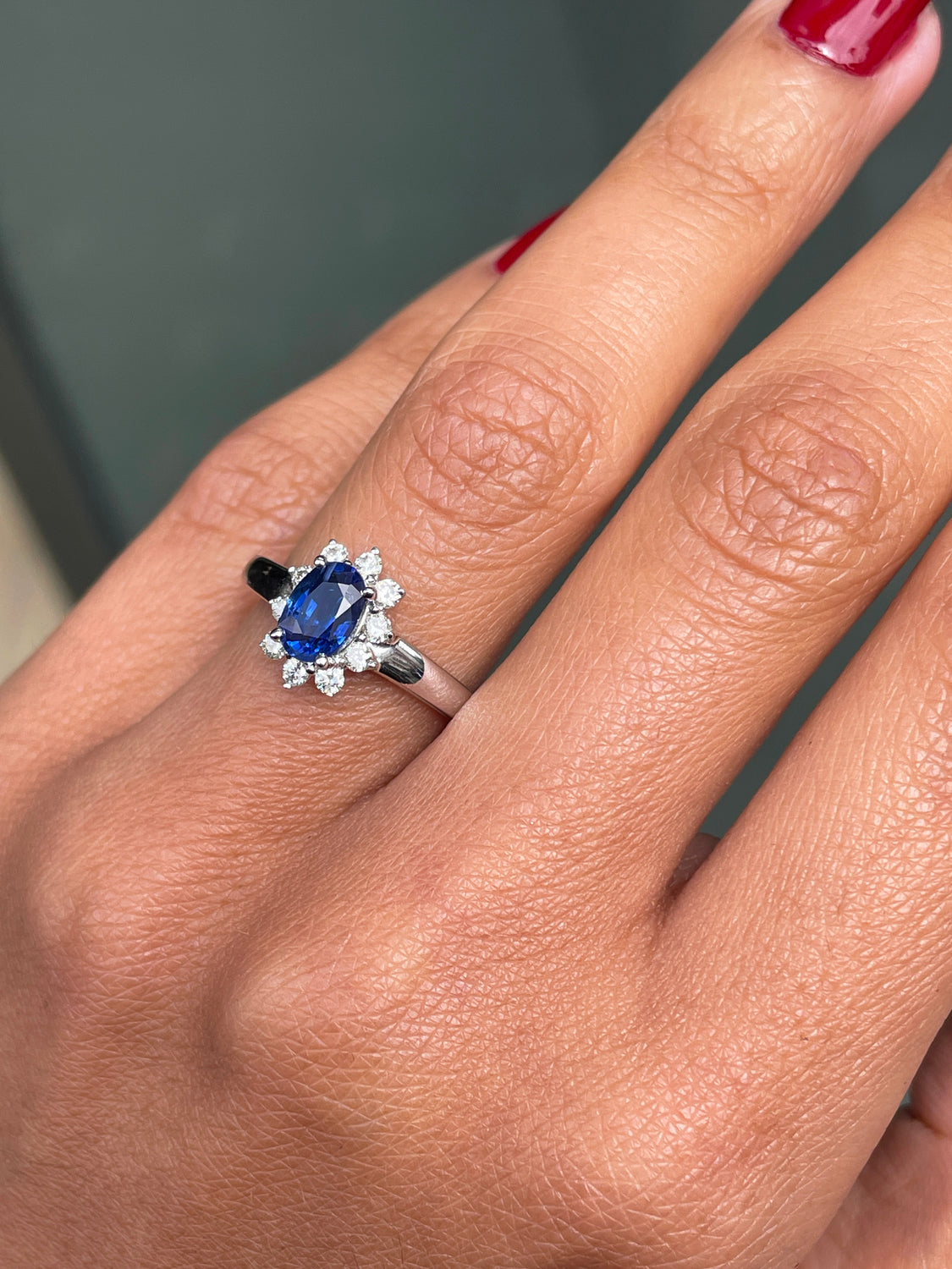 Oval Blue Sapphire and Diamond 18 Carat White Gold Cluster Engagement Ring