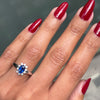 Oval Blue Sapphire and Diamond 18 Carat White Gold Cluster Engagement Ring