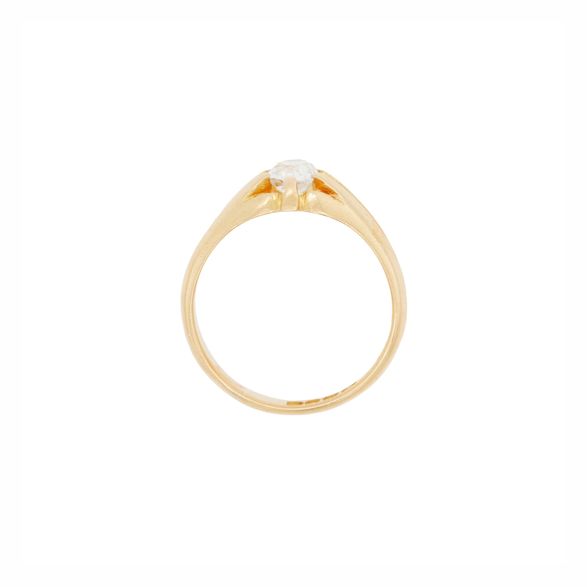 Gold ring with a diamond on a white background