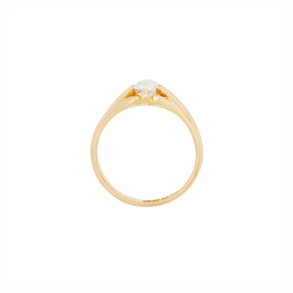 Gold ring with a diamond on a white background