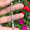 person holding French Pearl and Diamond Platinum Bracelet, Circa 1910
