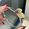 1.66 Carat Pink Tourmaline and Diamond 18 Carat White & Yellow Gold Leaf Bangle