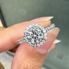 0.70ct E VS1 Diamond and Platinum Round Halo Cluster Engagement Ring