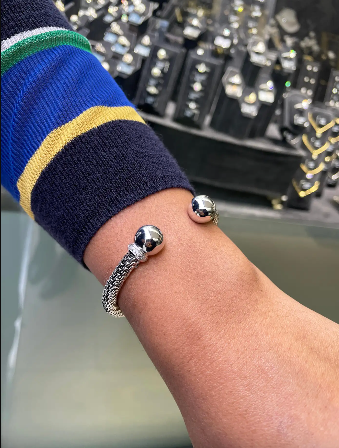 person wearing Diamond 18 Carat White Gold FOPE Woven Slip-on Cuff Bracelet