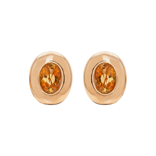 A pair of 18 carat yellow gold large oval stud earrings with a central citrine stone.