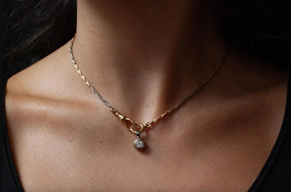 A Finely crafted 15 carat cool white and warm yellow gold paperclip style links Albert chain 1920's