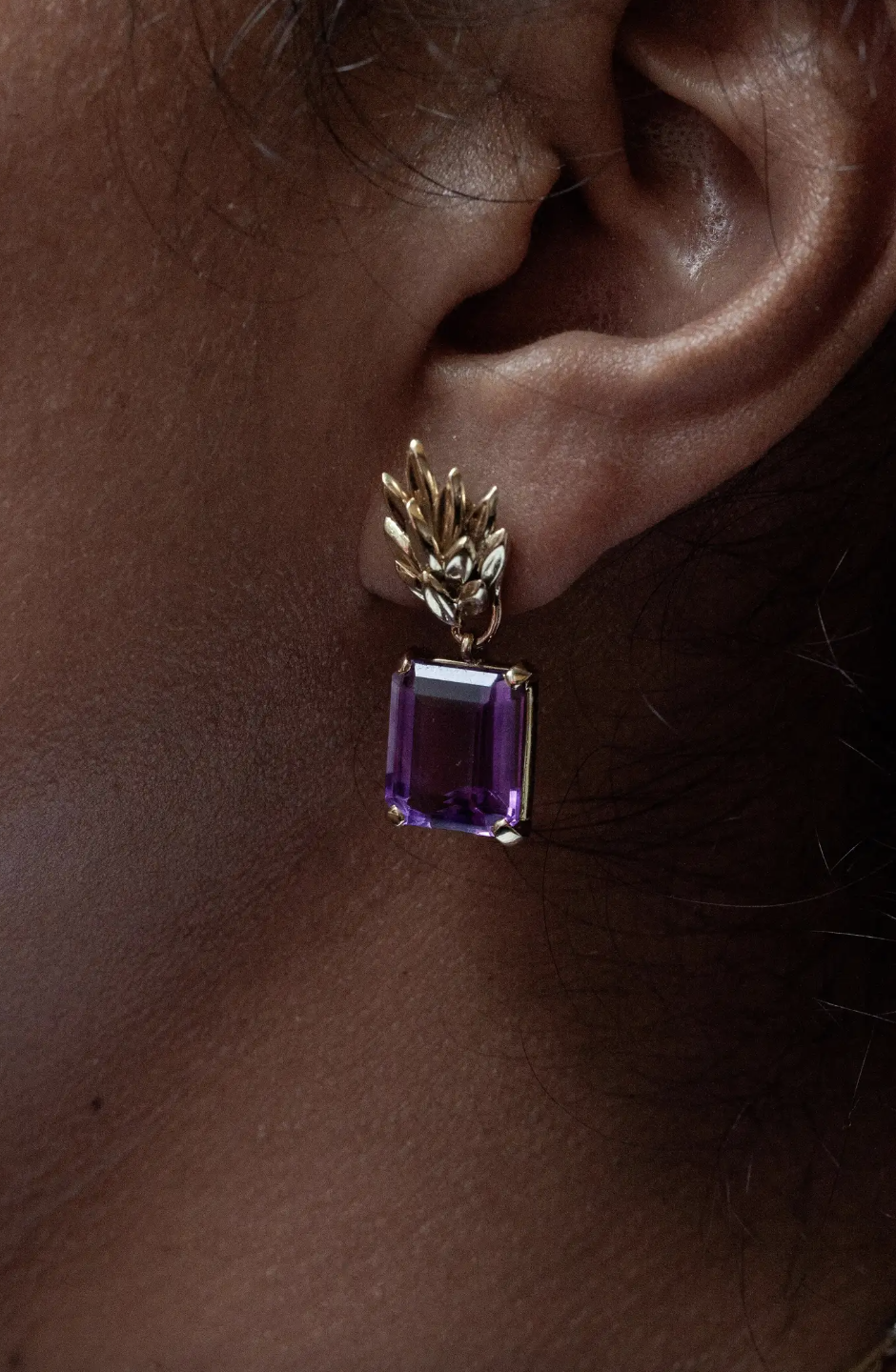 lady wearing a Vintage Amethyst 18 Carat Yellow Gold drop earing