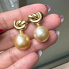 Golden Cultured Pearl and 18 Carat Yellow Gold Love Knot Dangle Earrings