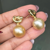 Golden Cultured Pearl and 18 Carat Yellow Gold Love Knot Dangle Earrings