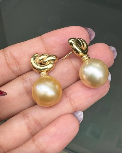Golden Cultured Pearl and 18 Carat Yellow Gold Love Knot Dangle Earrings