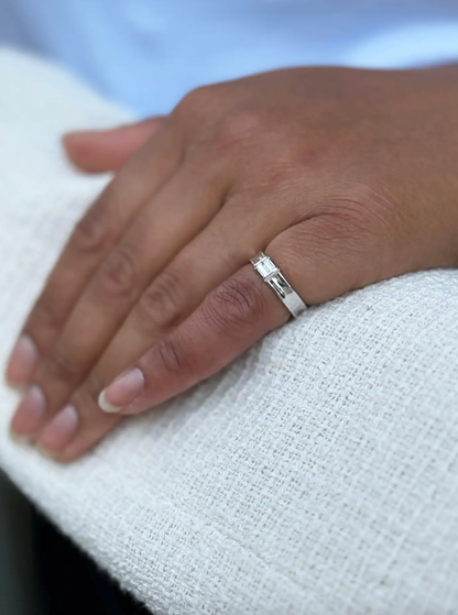 lady wearing Tiffany & Co. Baguette Cut Diamond and 18 Carat White Gold Wedding Band Ring