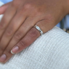 The wonderful tiffany & co piece features 2 fine quality baguette cut diamonds, weighing a total of approximately 0.30ct combined, channel set in an open back setting, at the centre of a high polish 18 carat white gold band.