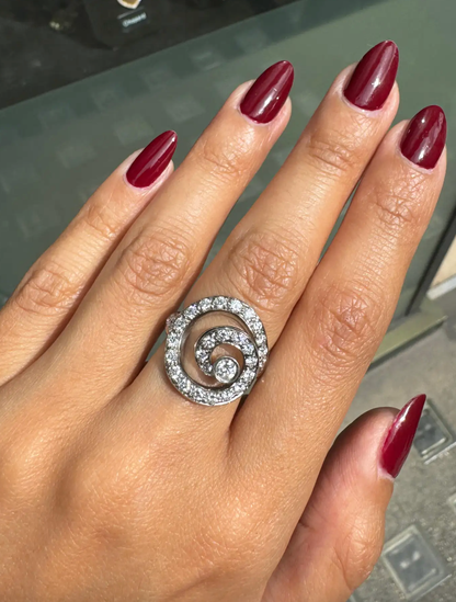 lady wearing Asprey Diamond and 18 Carat White Gold Swirl Cocktail Ring side view