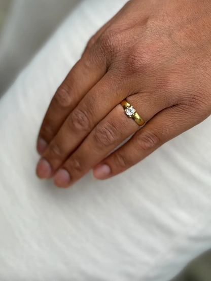 lady wearing Antique Old Mine Cut Diamond and 22 Carat Yellow Gold Solitaire Engagement Ring