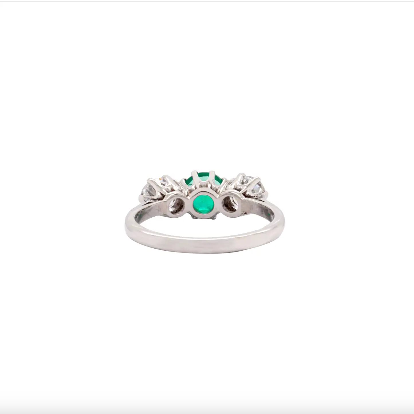 setting of antique three stone emerald and  and diamond ring