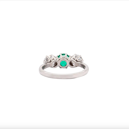 setting of antique three stone emerald and  and diamond ring
